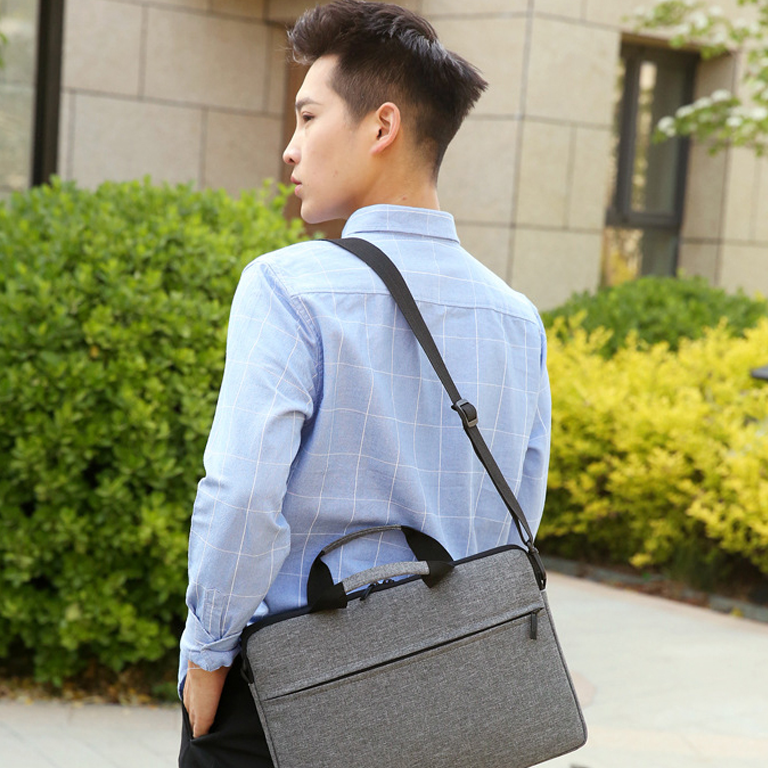 Stay stylish and organized with this sleek and durable laptop bag.