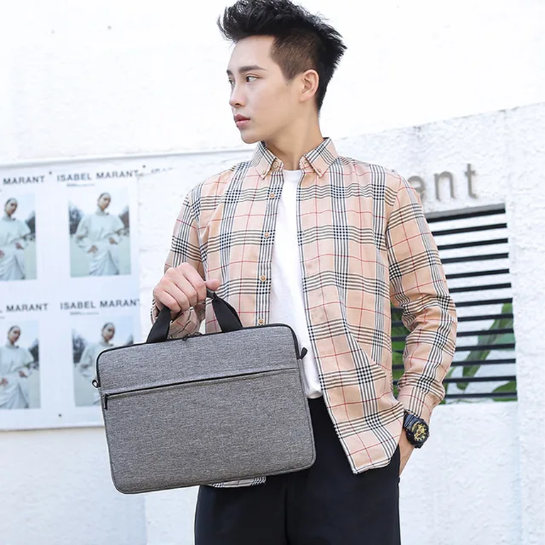 Stay stylish and organized with this sleek and durable laptop bag.